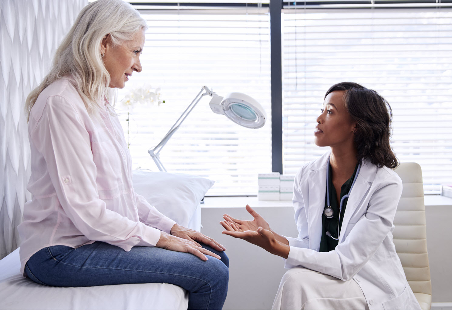 Healthcare provider engaging in motivational interviewing with a patient