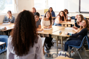 teens interacting in a classroom setting
