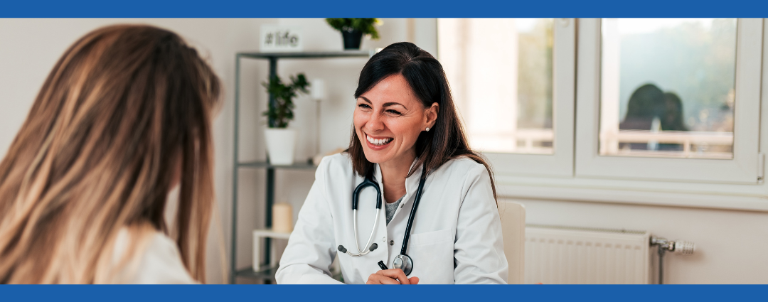 patient in consult with smiling doctor